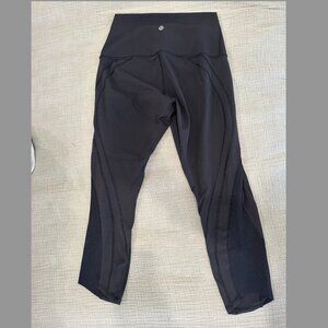 Black lululemon leggings with cutout detail